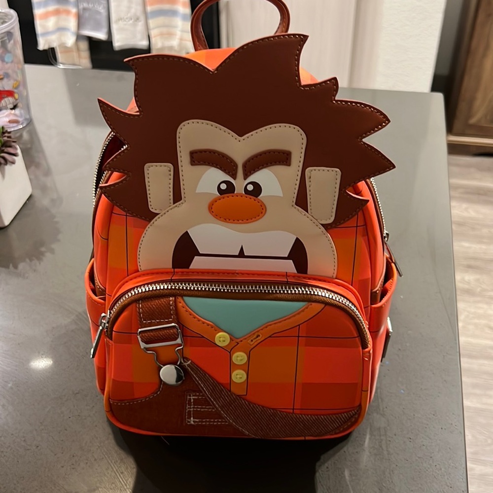 Loungefly wreck it Ralph. Never used. Tags and stuffing still on.